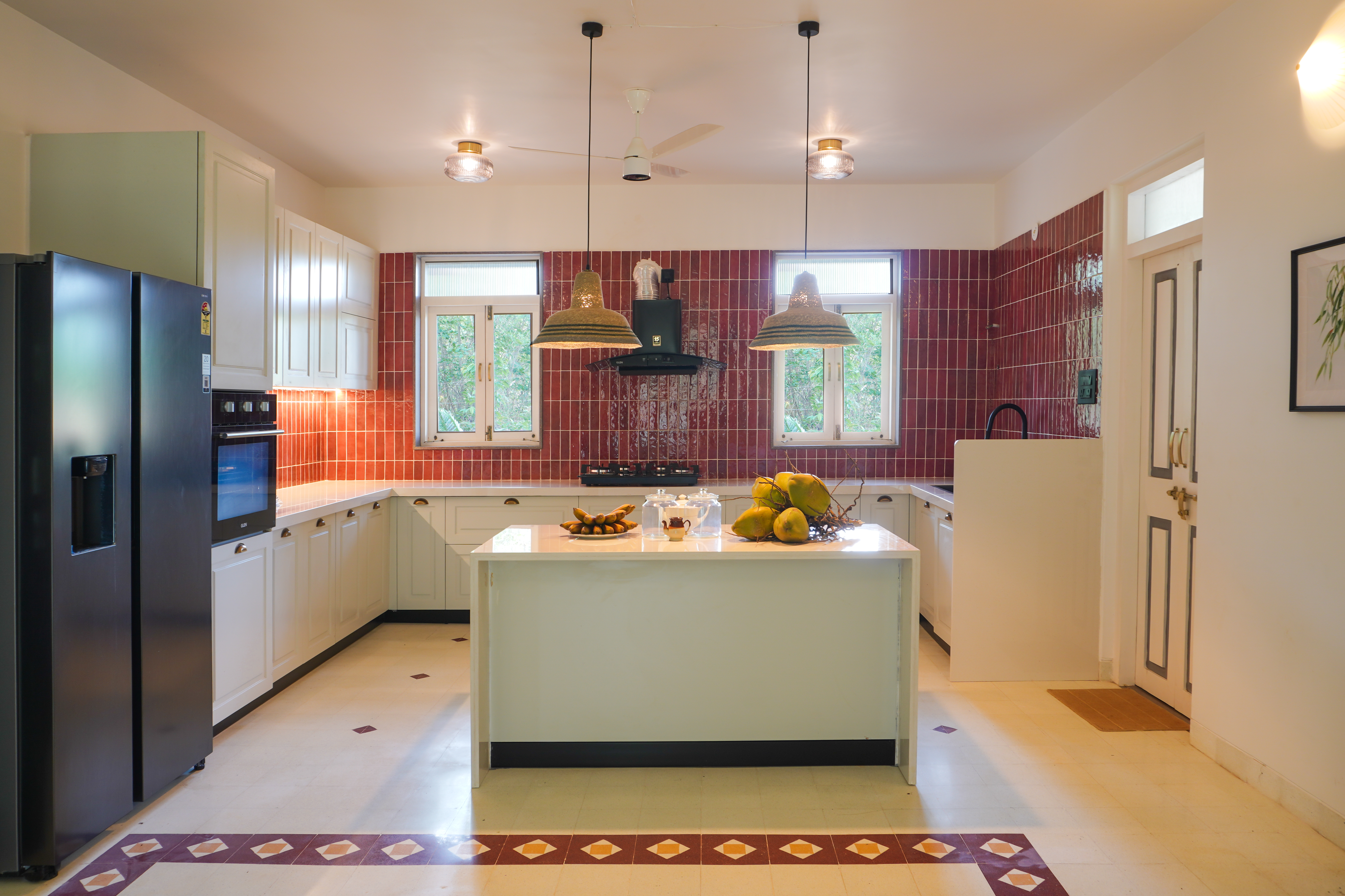 Asoga Premium Modular Kitchen — White shaker cabinetry, terracotta Zellige backsplash