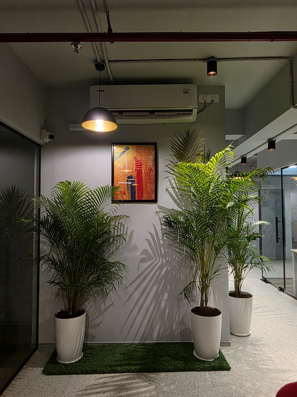 Eternal — branded breakout area with Good Food Good Mood mural